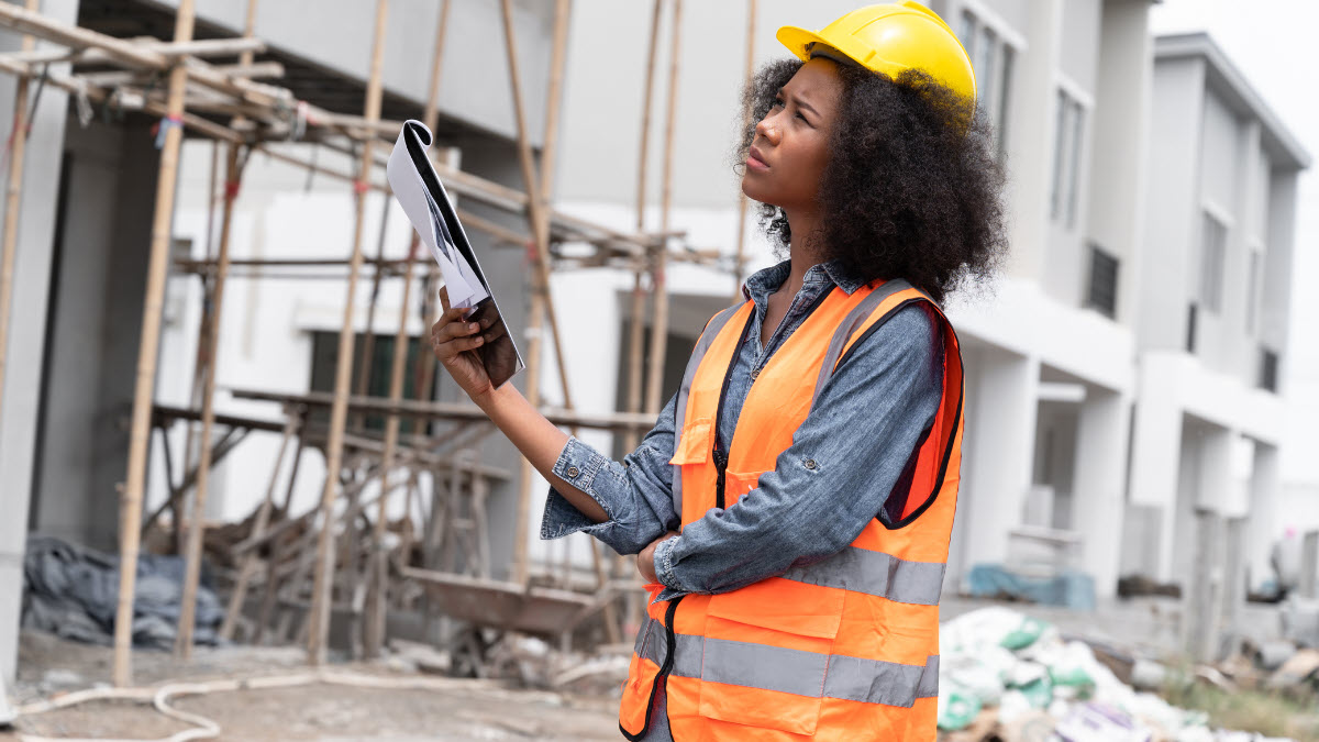 Female wearing a hard hat at a construction site