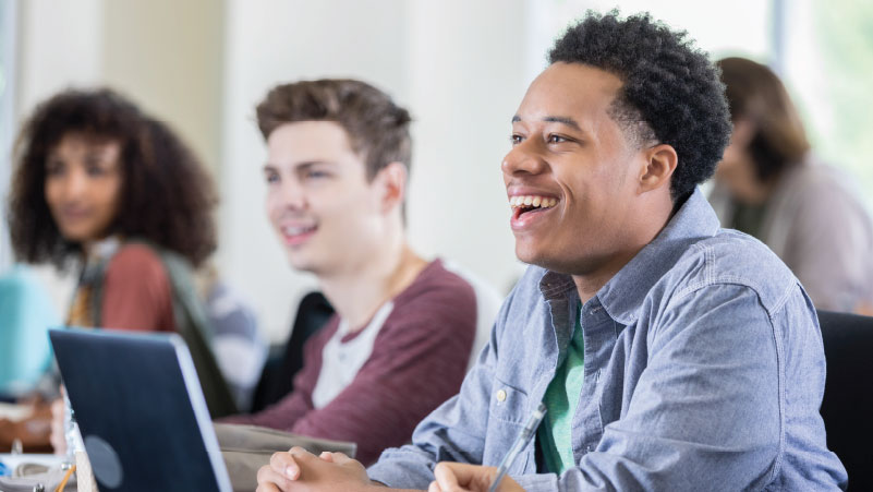 Man smiling after reviewing bank accounts information